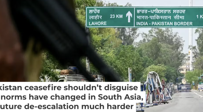 A member of the Indian Border Security Force stands guard near the India-Pakistan border. Narinder Nanu/AFP via Getty Images